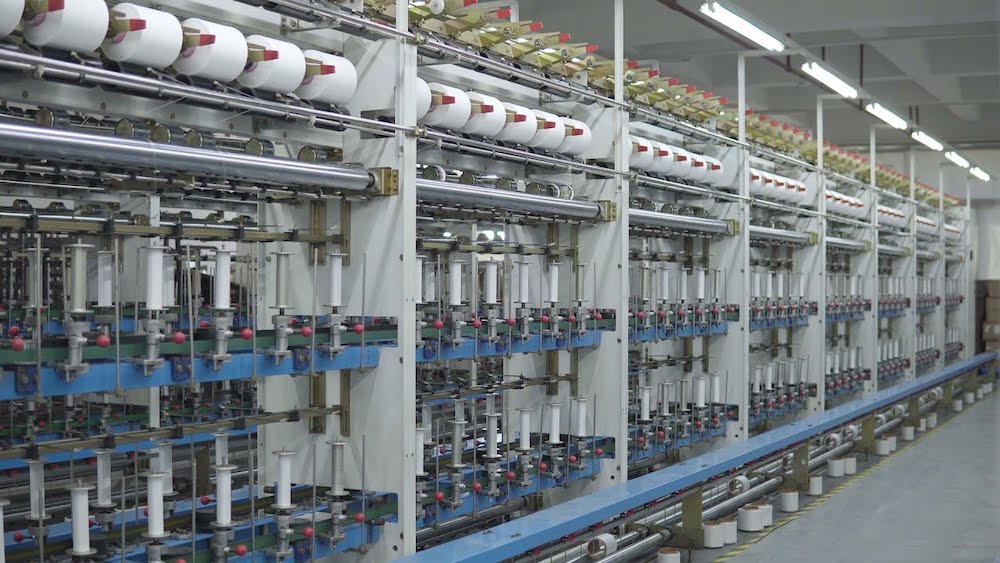The Manufacturing Process of Conventional Covered Yarn